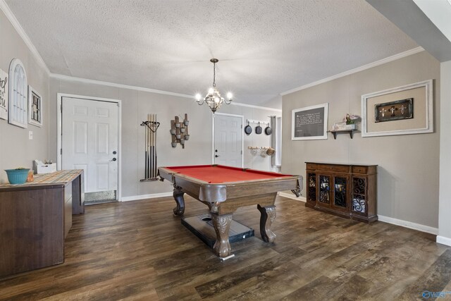 rec room with a textured ceiling, pool table, dark wood-style flooring, baseboards, and crown molding