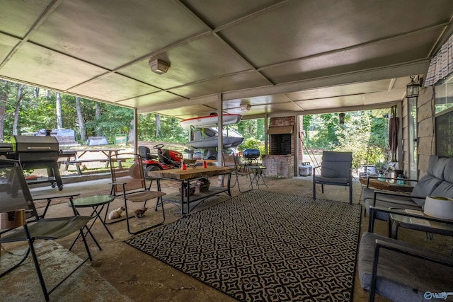 sunroom / solarium featuring a healthy amount of sunlight