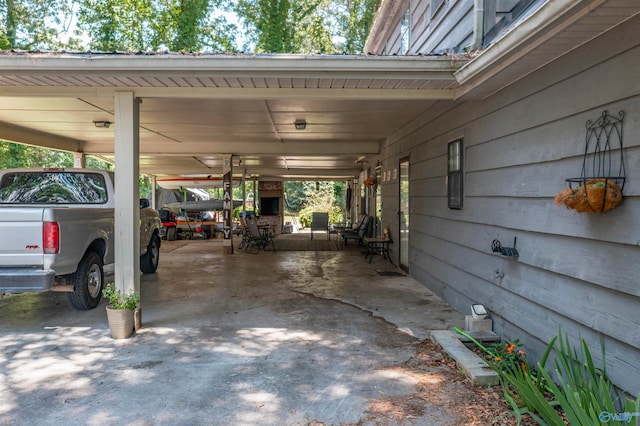 exterior space with a carport