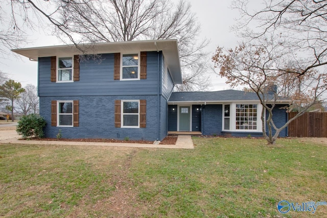 view of front of home featuring a front lawn