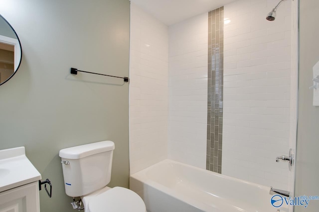 full bathroom with vanity, toilet, and tiled shower / bath