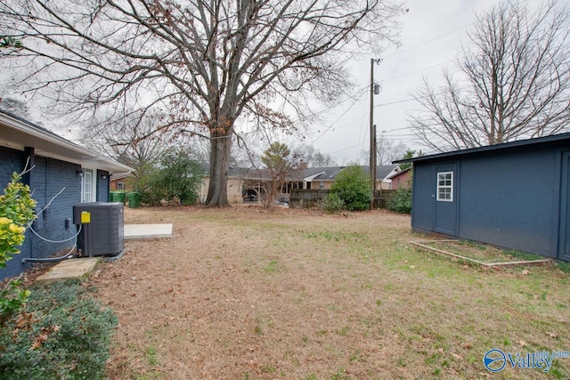 view of yard with central AC unit