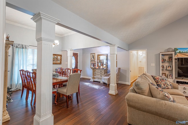 dining room with ornamental molding, dark hardwood / wood-style flooring, vaulted ceiling, and ornate columns