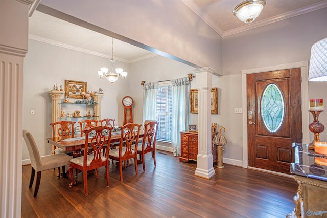 dining space featuring ornamental molding, a notable chandelier, dark hardwood / wood-style floors, and ornate columns