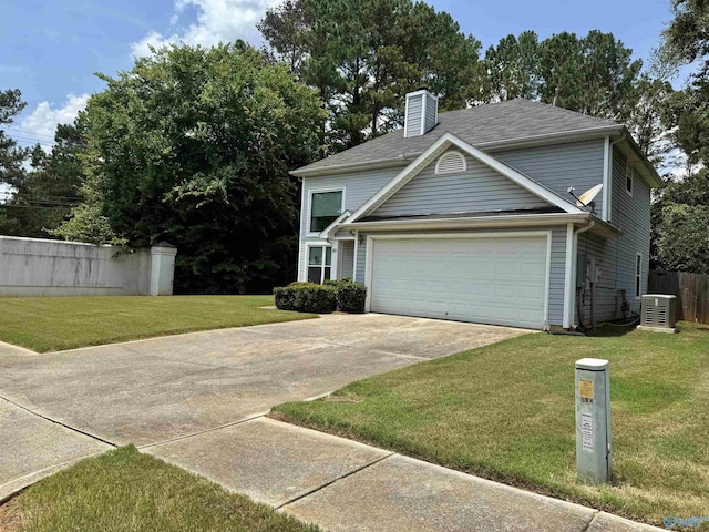 101 Maple Valley Dr, Madison, AL 35758 - view of front of home featuring driveway, a chimney, and an attached garage