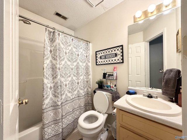 101 Maple Valley Dr, Madison, AL 35758 - full bathroom with vanity, a textured ceiling, and shower / bath combo