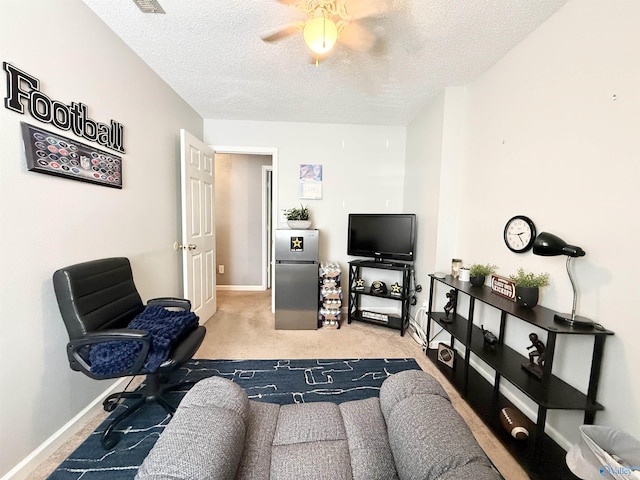 101 Maple Valley Dr, Madison, AL 35758 - living room featuring carpet, a textured ceiling, and ceiling fan