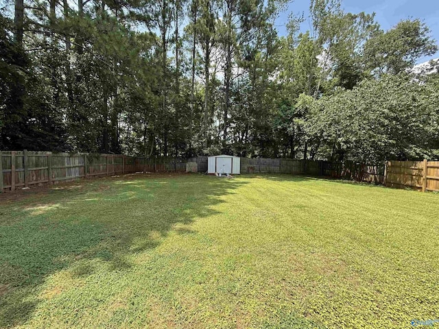 101 Maple Valley Dr, Madison, AL 35758 - fenced backyard featuring a storage shed