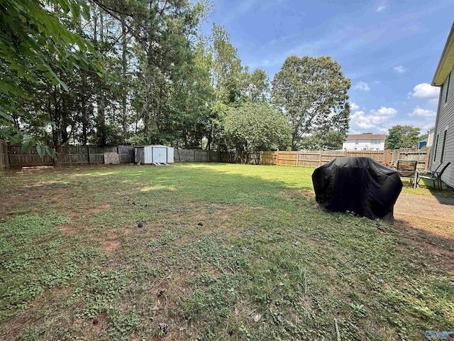 101 Maple Valley Dr, Madison, AL 35758 - fenced backyard with a storage shed