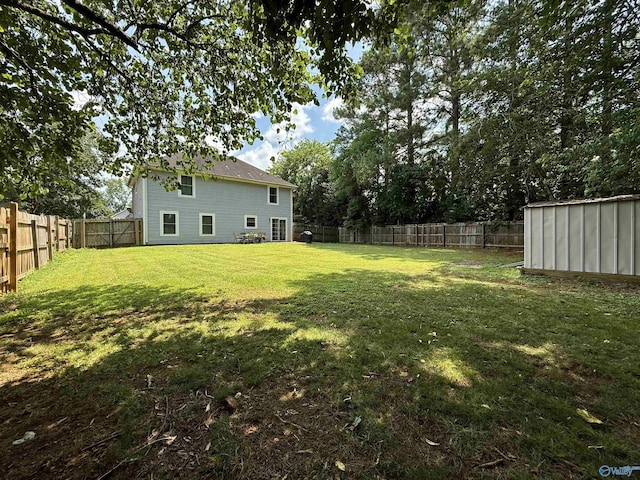 101 Maple Valley Dr, Madison, AL 35758 - fenced backyard featuring a shed