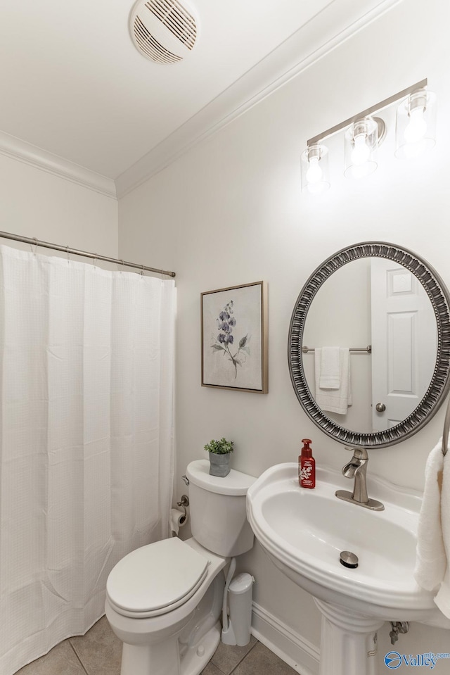 bathroom with sink, tile patterned flooring, ornamental molding, curtained shower, and toilet