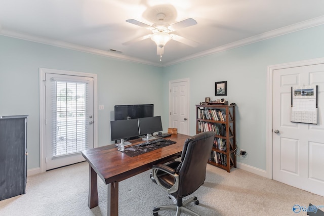 office space with crown molding, light colored carpet, and ceiling fan