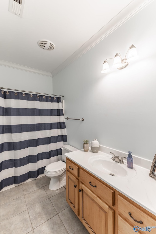 bathroom with ornamental molding, toilet, tile patterned flooring, and vanity