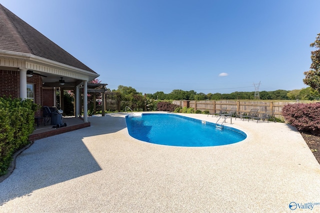 view of pool featuring ceiling fan, a pergola, and a patio area