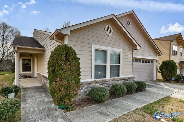 view of front of home with a garage