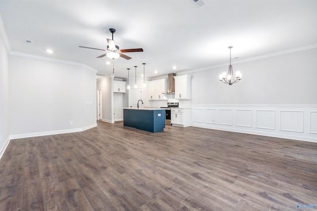 unfurnished living room featuring crown molding, sink, ceiling fan with notable chandelier, and wood-type flooring