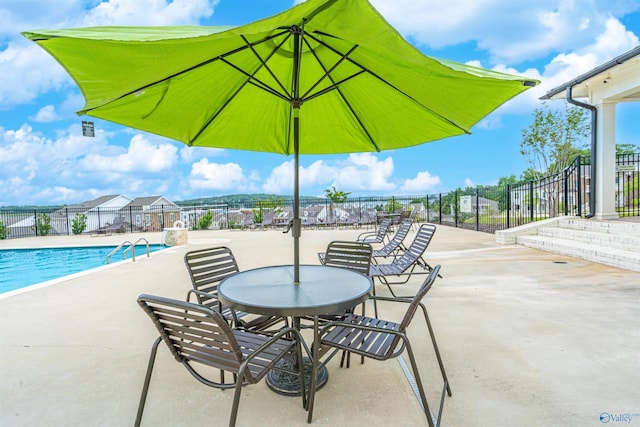 view of patio / terrace with a community pool