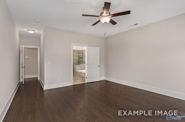 unfurnished bedroom with wood finished floors, visible vents, and baseboards