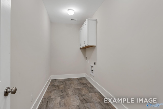 clothes washing area with cabinet space, baseboards, visible vents, and hookup for an electric dryer