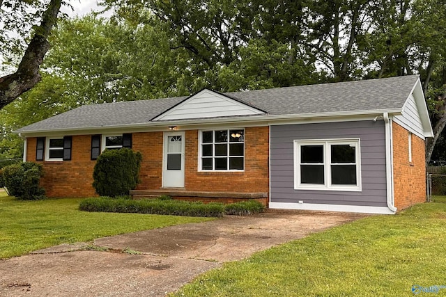 1701 Golf Club Ln NW, Huntsville, AL 35816 - single story home with a front yard, roof with shingles, and brick siding