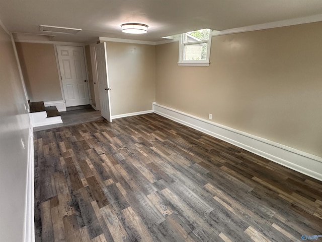 1701 Golf Club Ln NW, Huntsville, AL 35816 - below grade area with dark wood-style flooring and baseboards