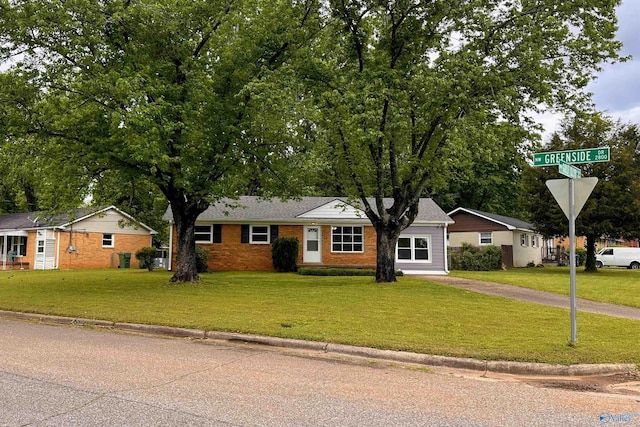 1701 Golf Club Ln NW, Huntsville, AL 35816 - view of front of house with driveway, a front yard, and brick siding