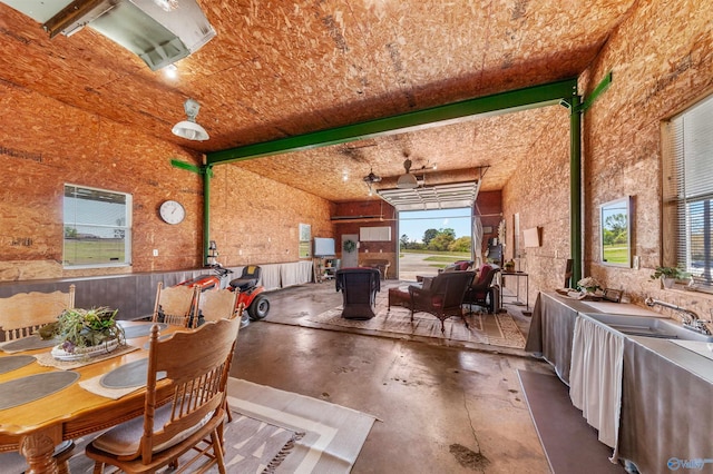 27906 Mooresville Rd, Elkmont, AL 35620 - dining room featuring finished concrete flooring and healthy amount of natural light