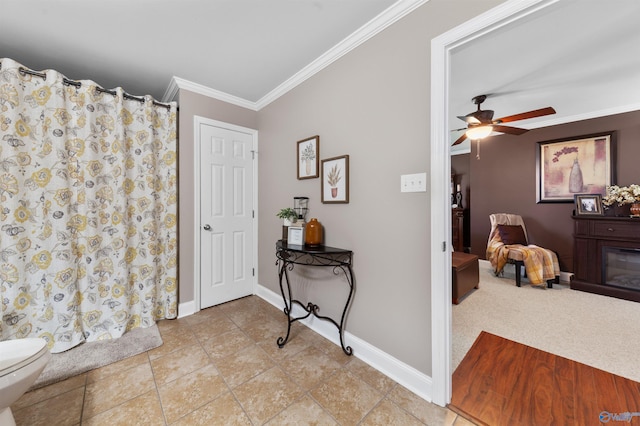 27906 Mooresville Rd, Elkmont, AL 35620 - foyer entrance with ornamental molding, a ceiling fan, and baseboards