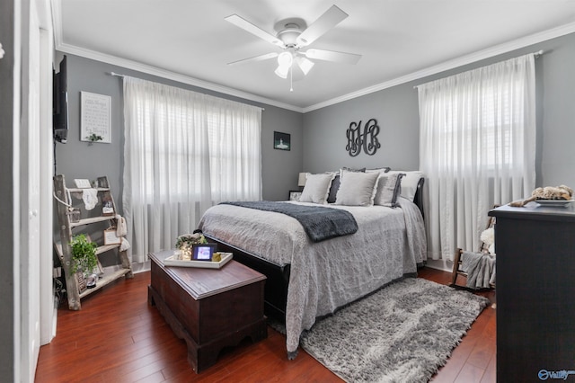 27906 Mooresville Rd, Elkmont, AL 35620 - bedroom featuring multiple windows, wood-type flooring, ornamental molding, and ceiling fan
