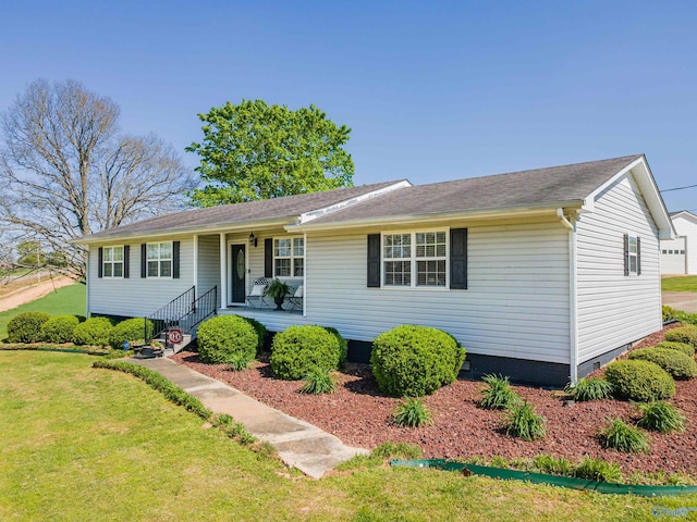 27906 Mooresville Rd, Elkmont, AL 35620 - ranch-style home with covered porch, a front lawn, and crawl space