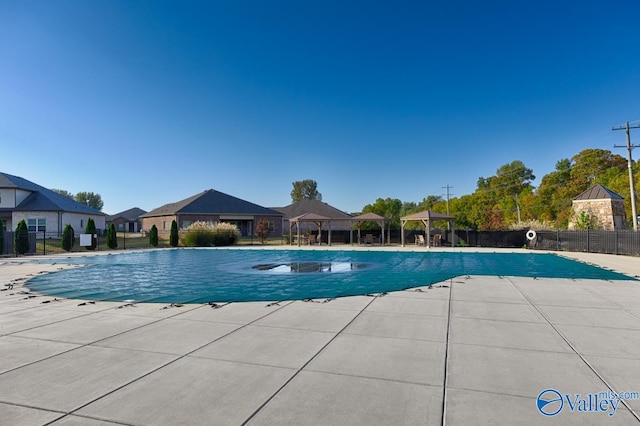 view of swimming pool featuring a patio