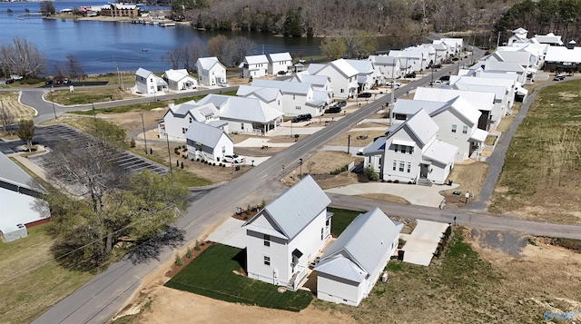 aerial view featuring a residential view and a water view