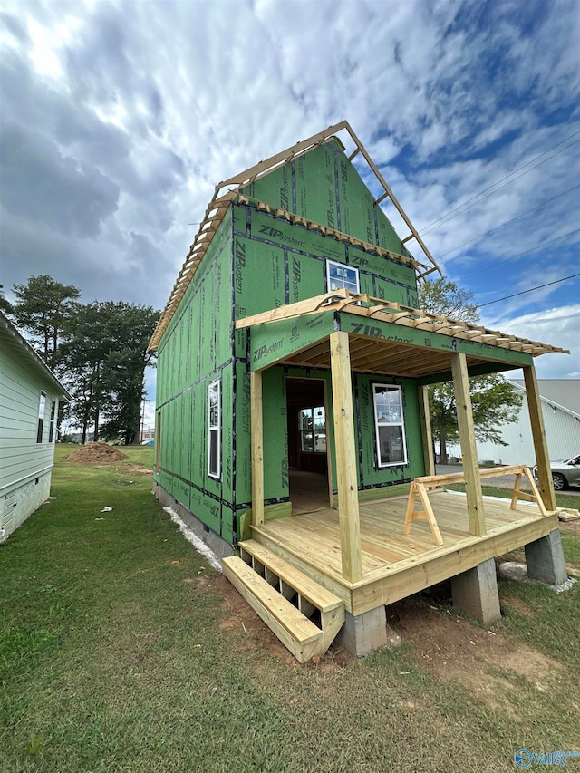 view of outbuilding with a lawn