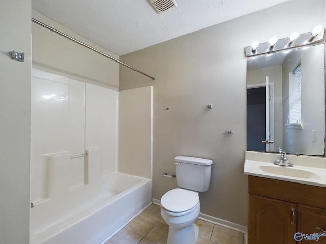 full bathroom with vanity, tile patterned flooring, a textured ceiling, toilet, and shower / bathing tub combination