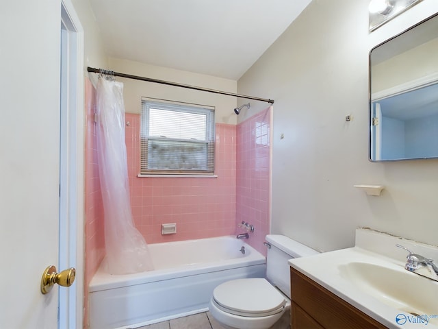 full bathroom featuring tile patterned floors, shower / bathtub combination with curtain, vanity, and toilet