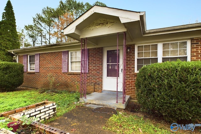 4227 Keith Dr NW, Huntsville, AL 35810 - doorway to property with brick siding