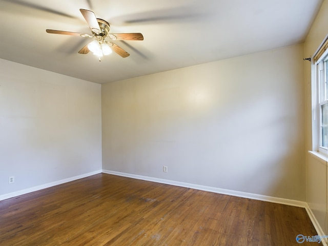 4227 Keith Dr NW, Huntsville, AL 35810 - spare room with ceiling fan, dark wood-style flooring, and baseboards