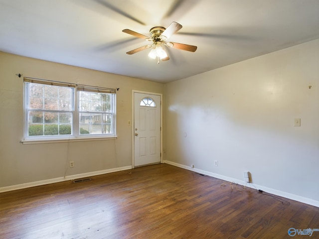 foyer entrance with dark hardwood / wood-style floors and ceiling fan