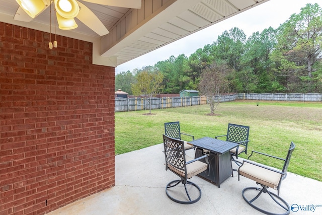 view of patio with ceiling fan