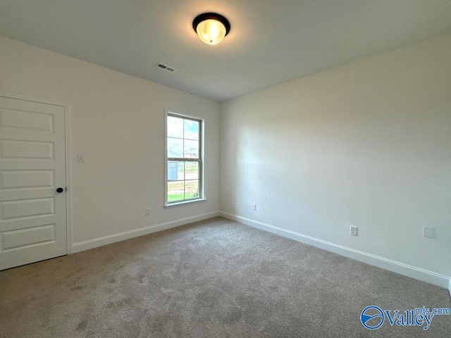 view of carpeted spare room