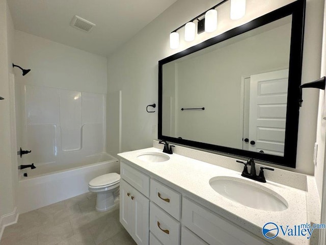 full bathroom with vanity, tile patterned floors, bathtub / shower combination, and toilet