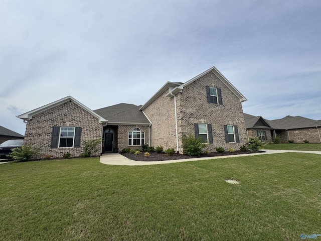 17401 Stonegate Dr, Athens, AL 35613 - view of front of home with a front yard and brick siding