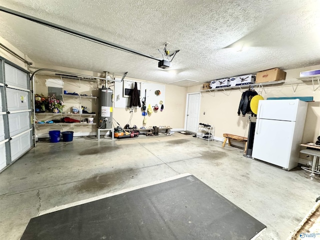 garage featuring water heater, a garage door opener, and freestanding refrigerator