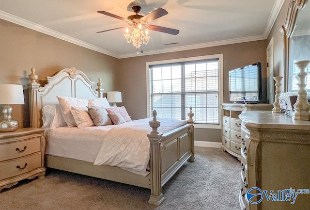 carpeted bedroom featuring crown molding and ceiling fan