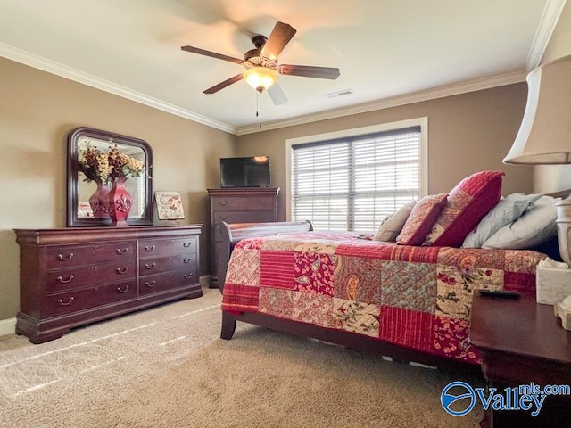 bedroom with carpet, ceiling fan, and ornamental molding