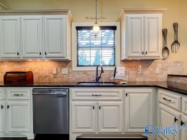 kitchen with white cabinets, sink, hanging light fixtures, stainless steel dishwasher, and decorative backsplash