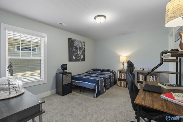 1530 Trek St NE, Huntsville, AL 35811 - carpeted bedroom featuring multiple windows and baseboards