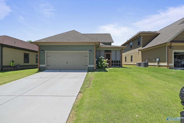 1530 Trek St NE, Huntsville, AL 35811 - view of front of home with a garage, a front lawn, driveway, and a shingled roof
