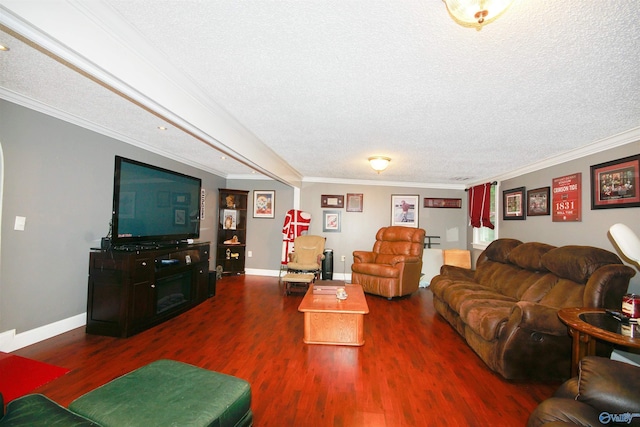 living room featuring dark wood-type flooring, ornamental molding, and a textured ceiling