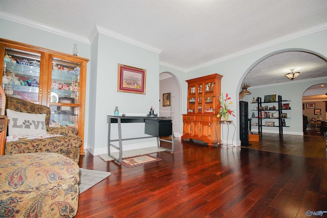 sitting room with ornamental molding, a textured ceiling, and dark hardwood / wood-style flooring